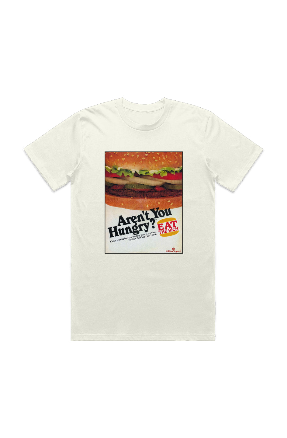 Off-white organic cotton t-shirt featuring a retro fast food parody graphic. The image shows a zoomed-in burger, with bold black text reading “Aren’t You Hungry?” and a red-and-yellow logo that says “EAT THE RICH.” Below, a tagline reads: “It’s not a metaphor. The working class is starving. No Gods. No Kings. Just Lunch.” Left Face Apparel branding is visible at the bottom.